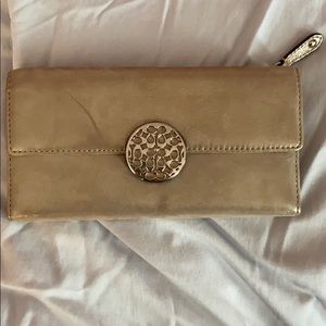 Large COACH gold trifold wallet
